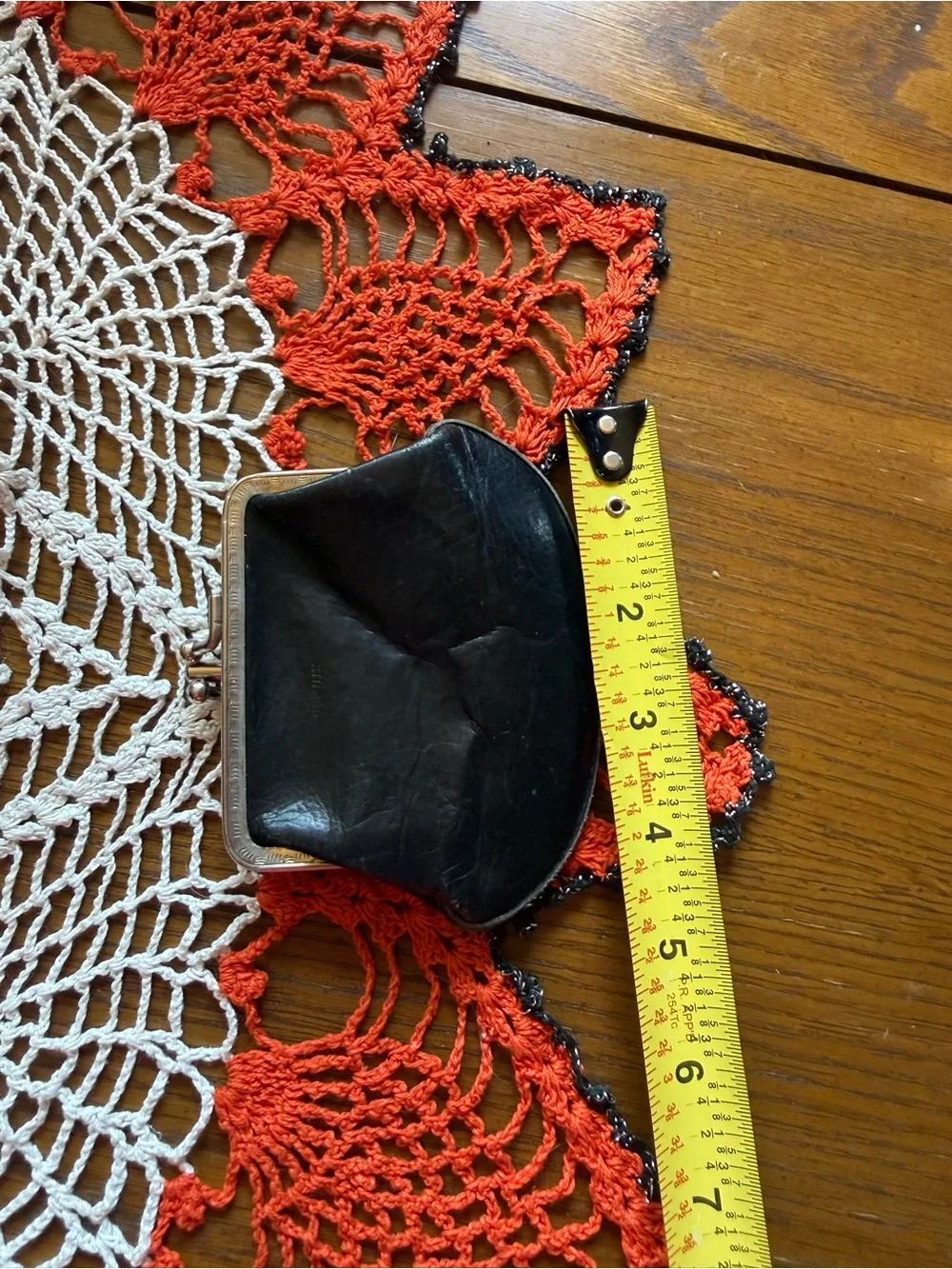 Vintage mid-century black leather coin purse with kiss-lock frame